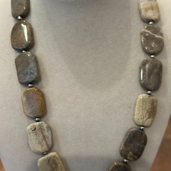 This necklace is a chunky, natural stone necklace with a carved flower pendant - Picture 10 of 10